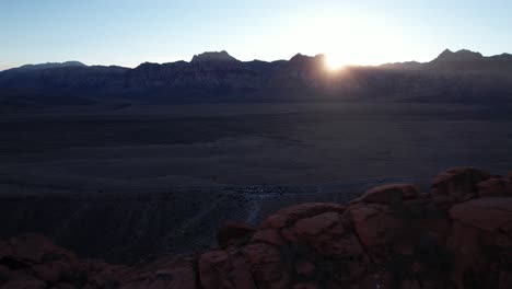 aerial-footage-of-red-rock-canyon-geologic-formation-during-sunset-in-California-las-Vegas-usa