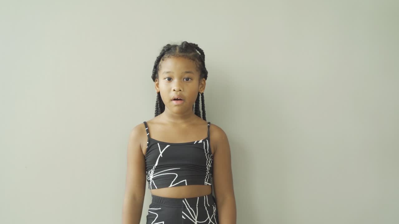 Portrait of happy smiling young black African American student girl studying from home and talking to friends in webcam group video call conference online. People lifestyle