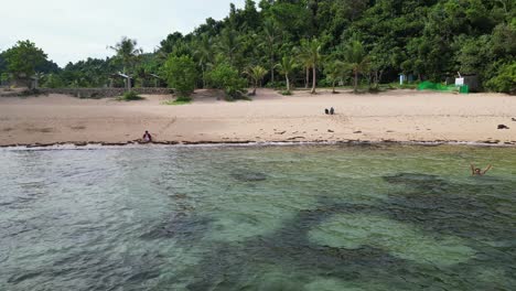 aerial fly into tropical beach, catanduanes, philippines