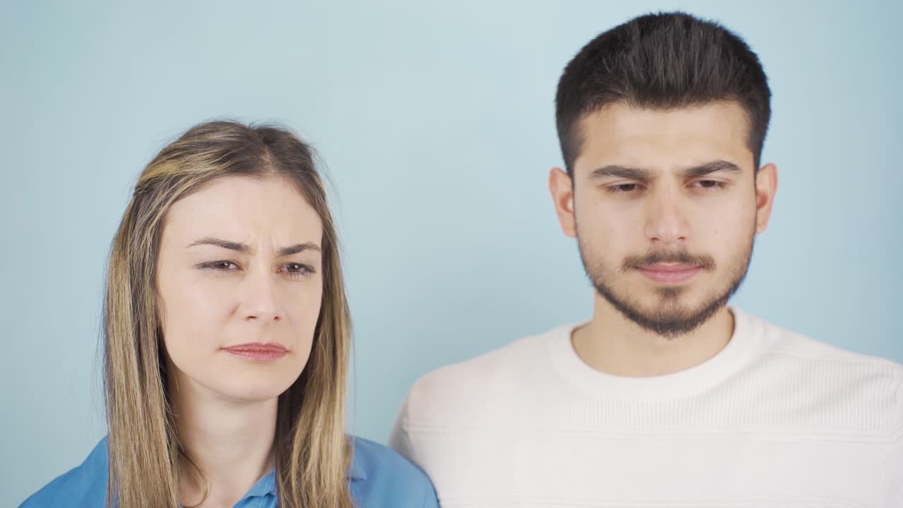 The cute couple is sleepy and yawning.