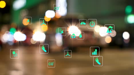 energía y iconos ambientales animación sobre la calle de la ciudad borrosa por la noche