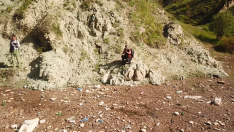 photographer capturing the beauty of mountains and lakes, i also collect waste, highlighting the danger of pollution and its harmful effects on ecosystems and marine life garbage collect activity iran