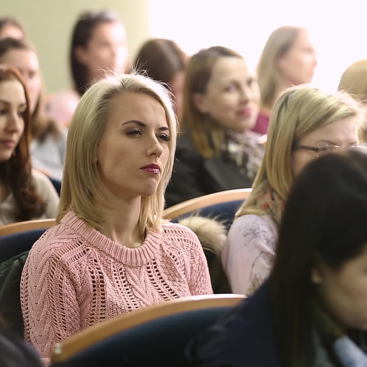 Audience Listens In A Conference Hall