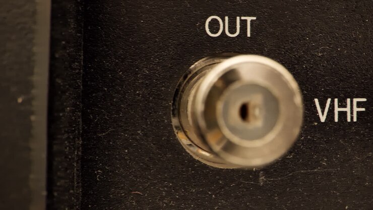 Extreme close up of the back of a vintage VCR VHF inputs and outputs antennae