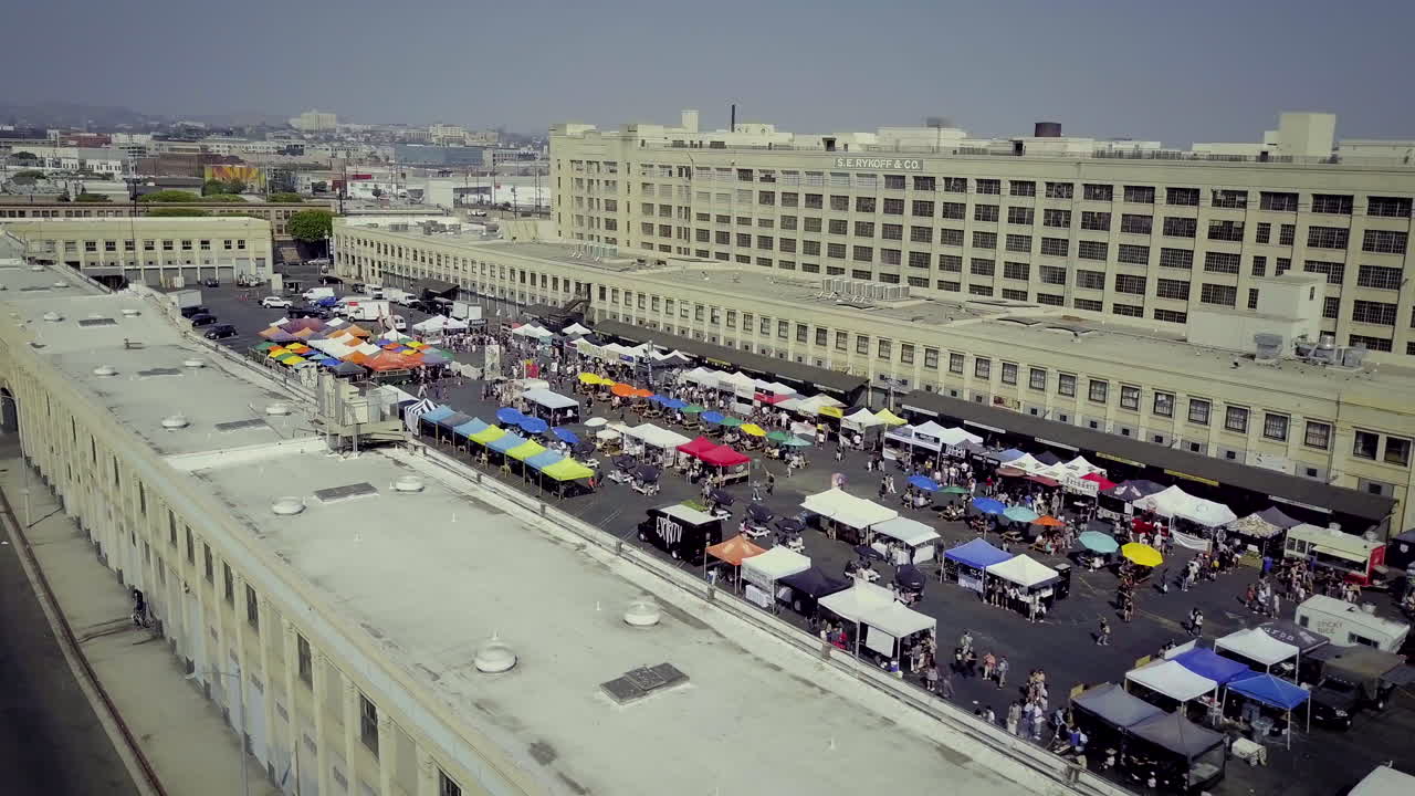 Aerial View of a Vibrant Outdoor Market in an Urban Setting