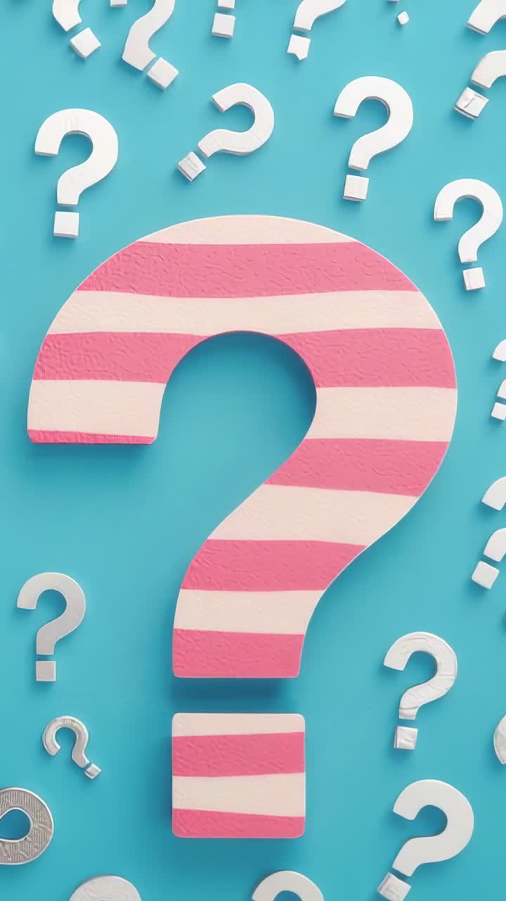 Vertical video: Showing large pink-striped question mark on teal wall with white question marks