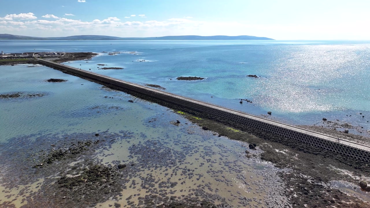 Aerial view of Causeway to Mutton Island, Galway, Ireland. Popular walking and cycling, leisure spot.