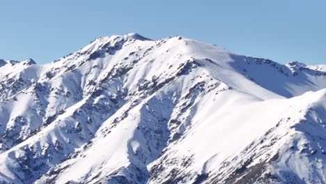 Spectacular-view-of-frozen-icy-mountain-peak-during-New-Zealand-winter