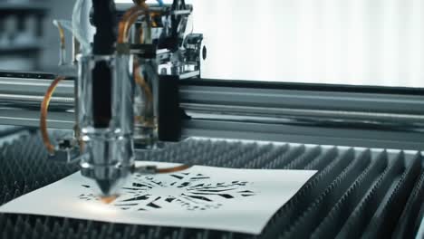 intricate laser cutting process captured in high detail, showcasing precision and artistry in crafting unique designs from paper with precision laser machinery