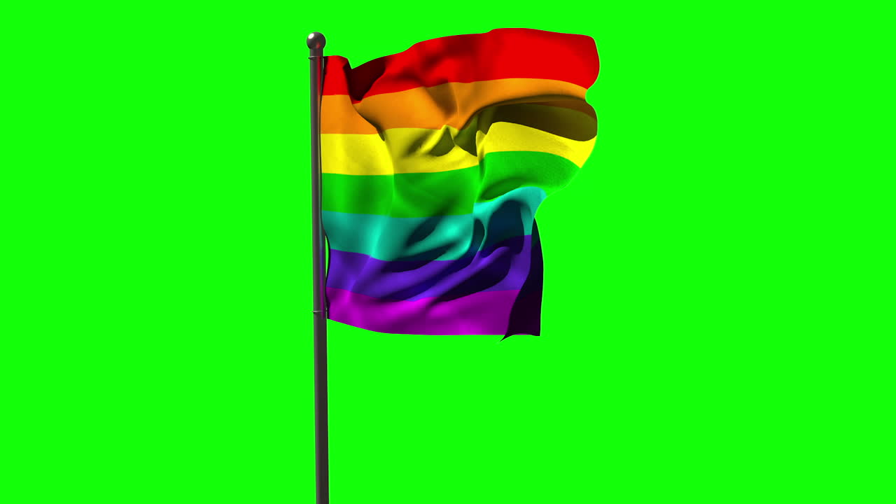 bandera del arco iris soplando contra la pantalla verde