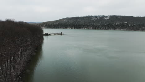 aerial view of vast lake sequoyah tranquil water on a winter day, old bridge