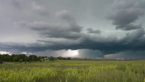storm moving across busy metro area of denver time lapse