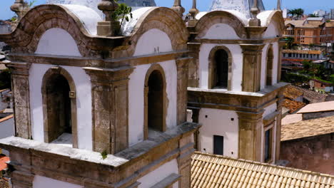 Aerial-view-of-a-top-of-a-church-close-to-Pelourinho,-Salvador,-Bahia,-Brazil