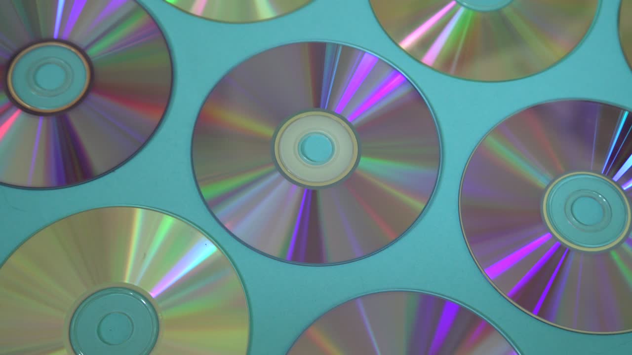 Vintage CD or DVD disk background, old circle discs used for data storage, share movies and music
