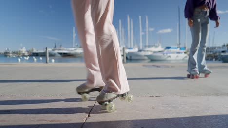 women roller skating at the waterfront