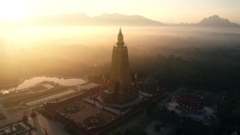 golden pagoda at sunrise, aerial view