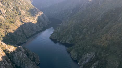 sweeping drone overview of cañón del río sil, ribeira sacra, galicia, spain, river bends through rocky cliffs