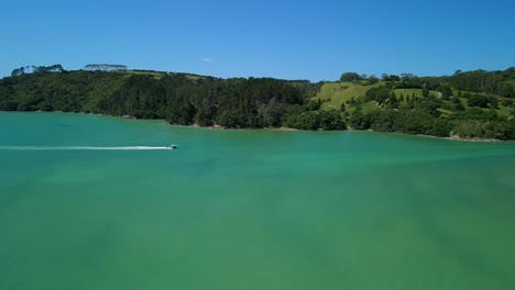 fishing boat motoring through waters off the east coast in new zealand