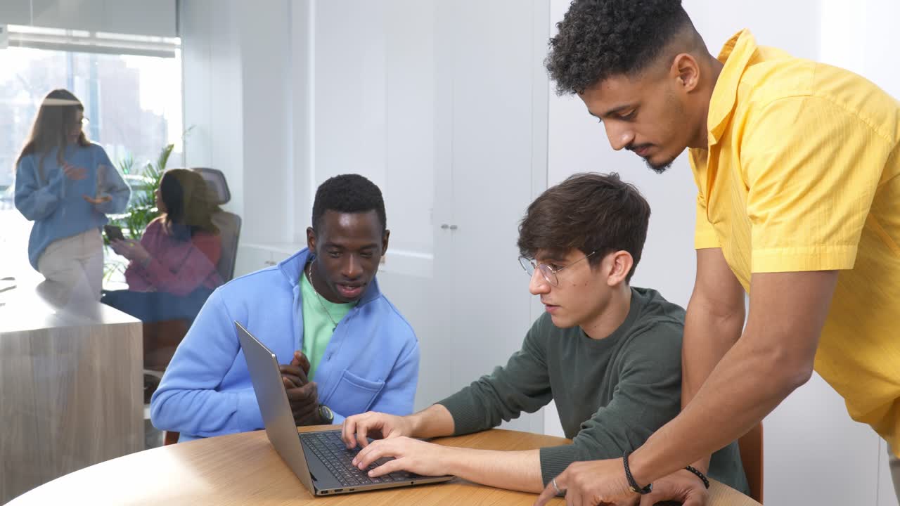 Team of young professionals collaborating on a project