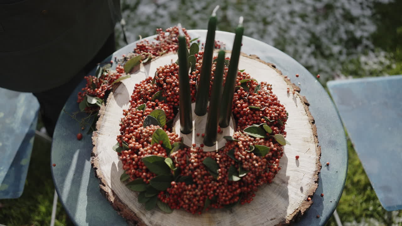 Rustic Autumn Wreath with Candles on a Wooden Slice