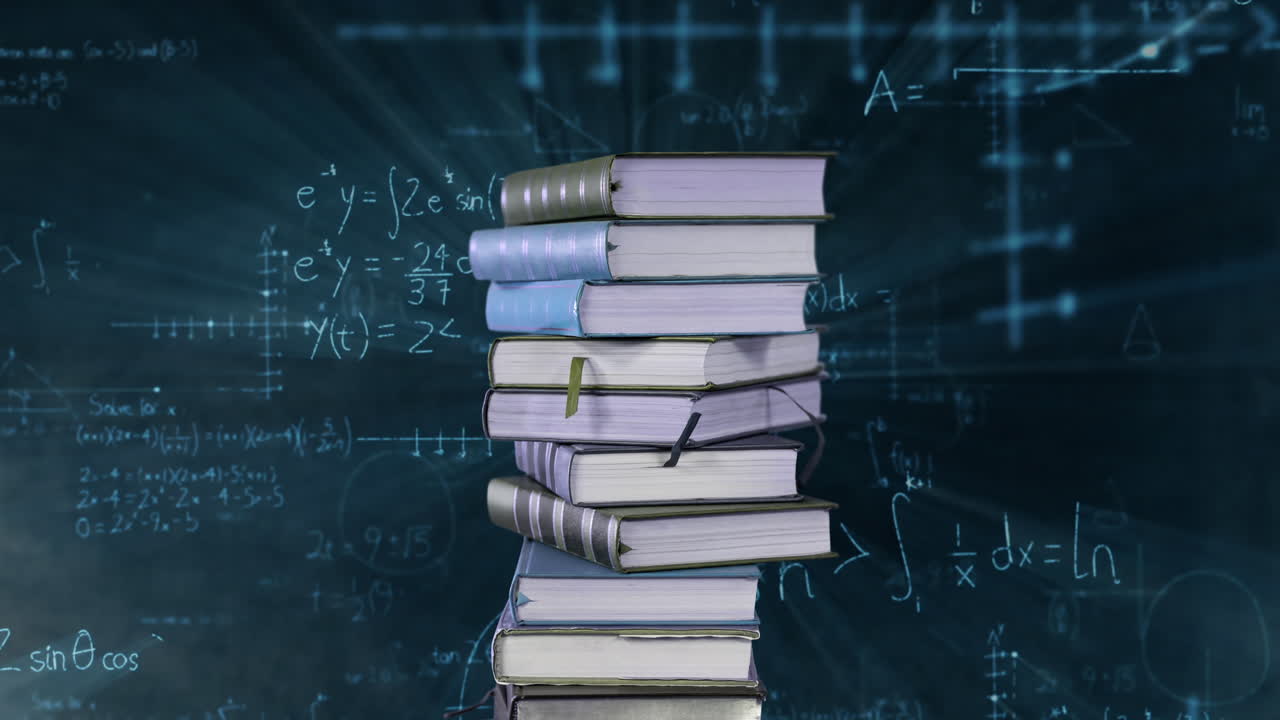 Pile of books and mathematical equations and graphs