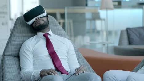 relaxed colleagues in vr headsets