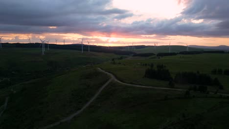 Aerial-footage-of-windfarm-at-sunset