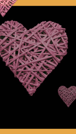 animation of pink hearts moving on black background