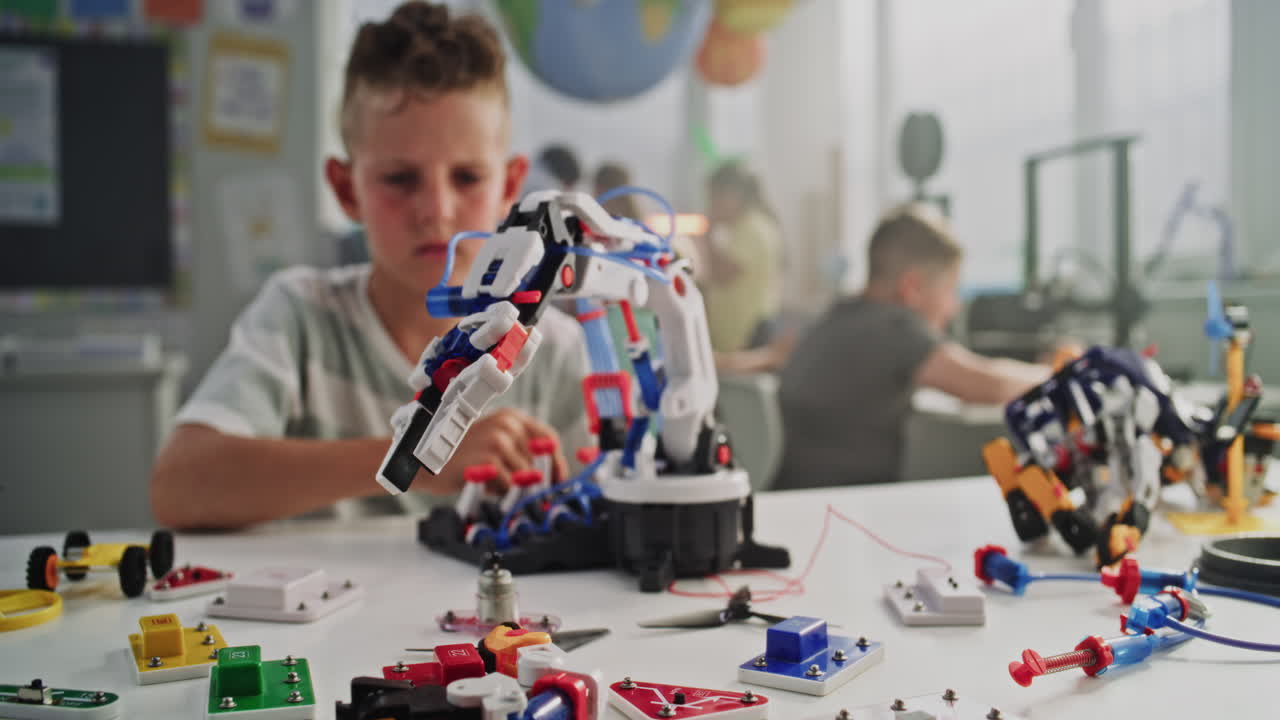 Primary School Student Studying Robotic Arm Model Learning Science and Robotics