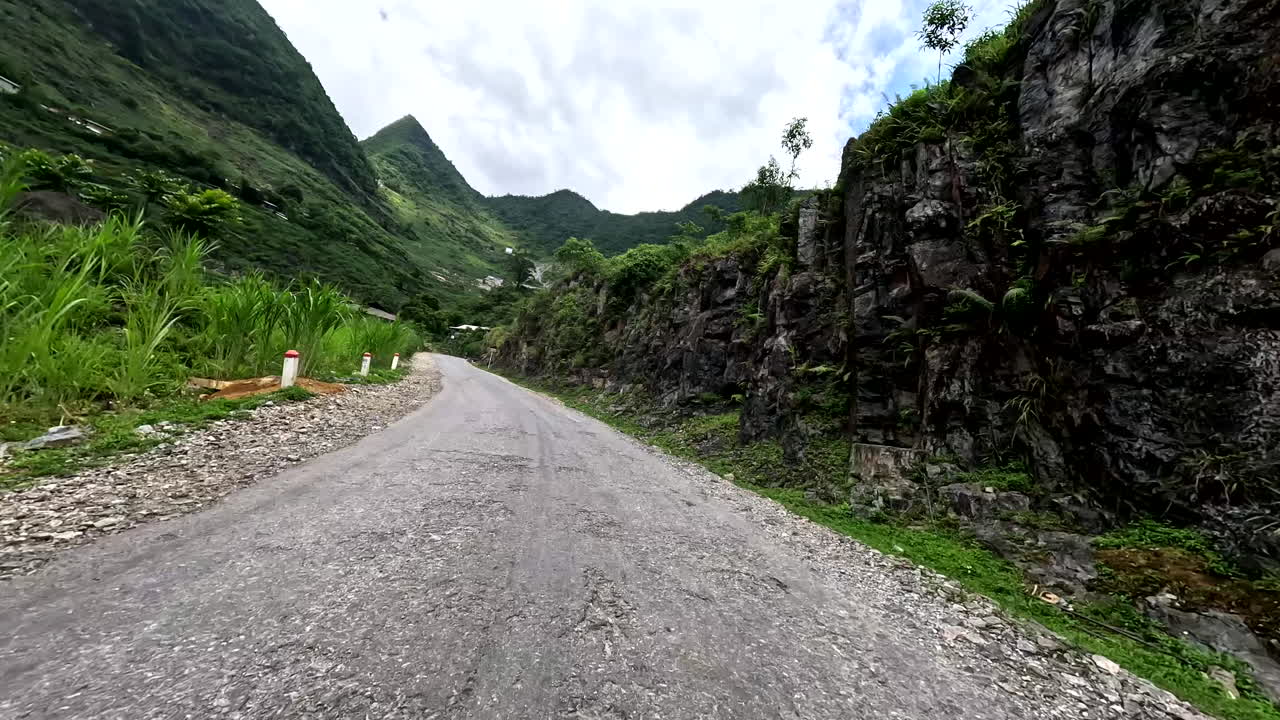Ha Giang Loop, Northern Vietnam, Asia - Riding a Scooter Along the Scenic Route Near Dong Van - POV