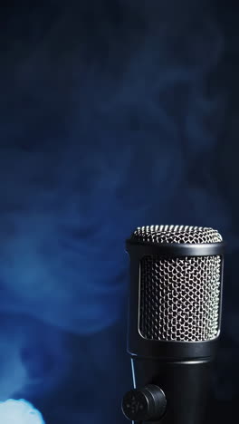 microphone against blue smoke background