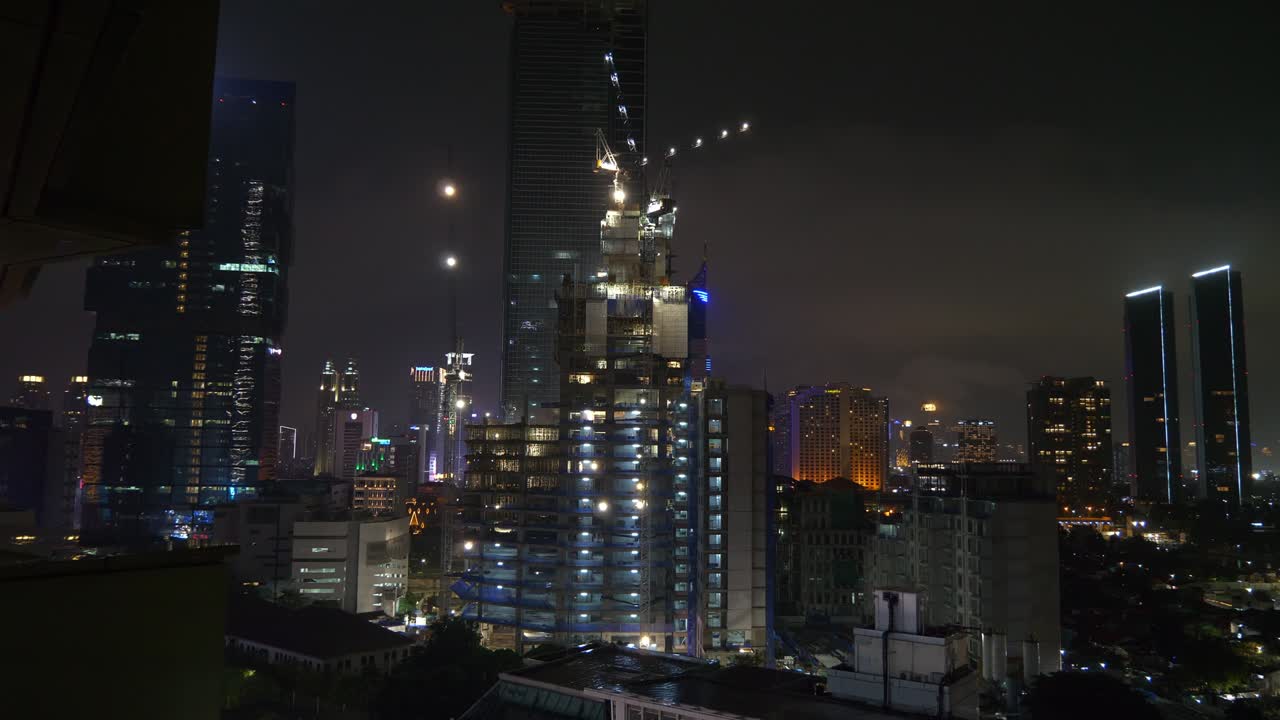 iluminación nocturna ciudad de jakarta centro construcción techo panorama 4k indonesia