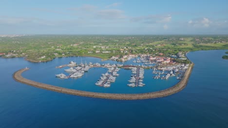 Panoramic-View-Over-Casa-de-Campo-Marina-In-The-Dominican-Republic---aerial-drone-shot