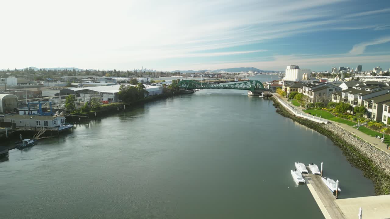 Golden light casts shadows over the Tidal Canal as a drone captures the iconic Park Street Bridge.