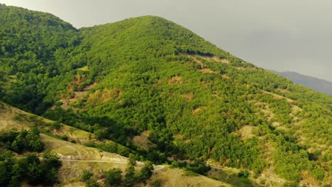 view-of-green-mountains-partly-sunny-partly-cloudy