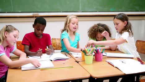 smiling pupils drawing together