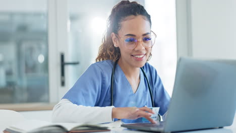 Doctor,-laptop-and-happy-woman-typing-online