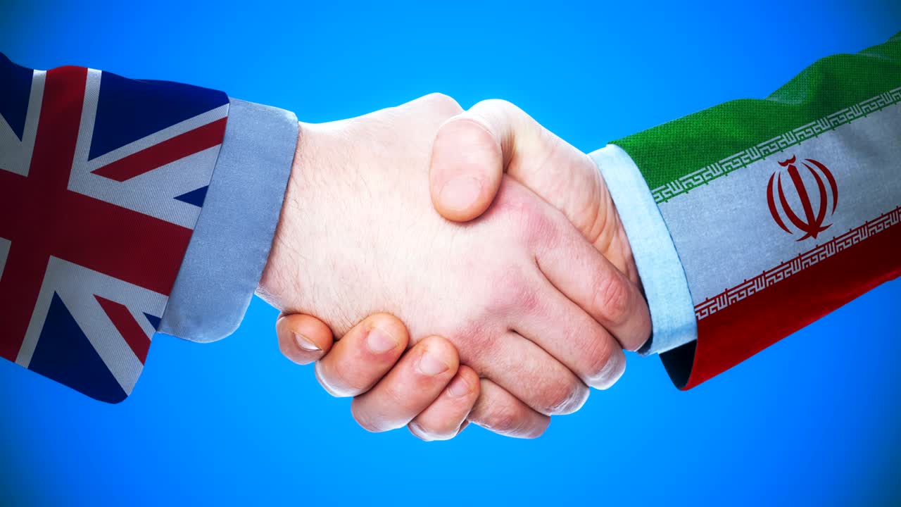 United Kingdom - Iran / Handshake concept animation about countries and politics / With matte channel