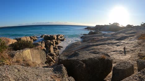 time lapse shot of waving water at bay of fires in tasmania