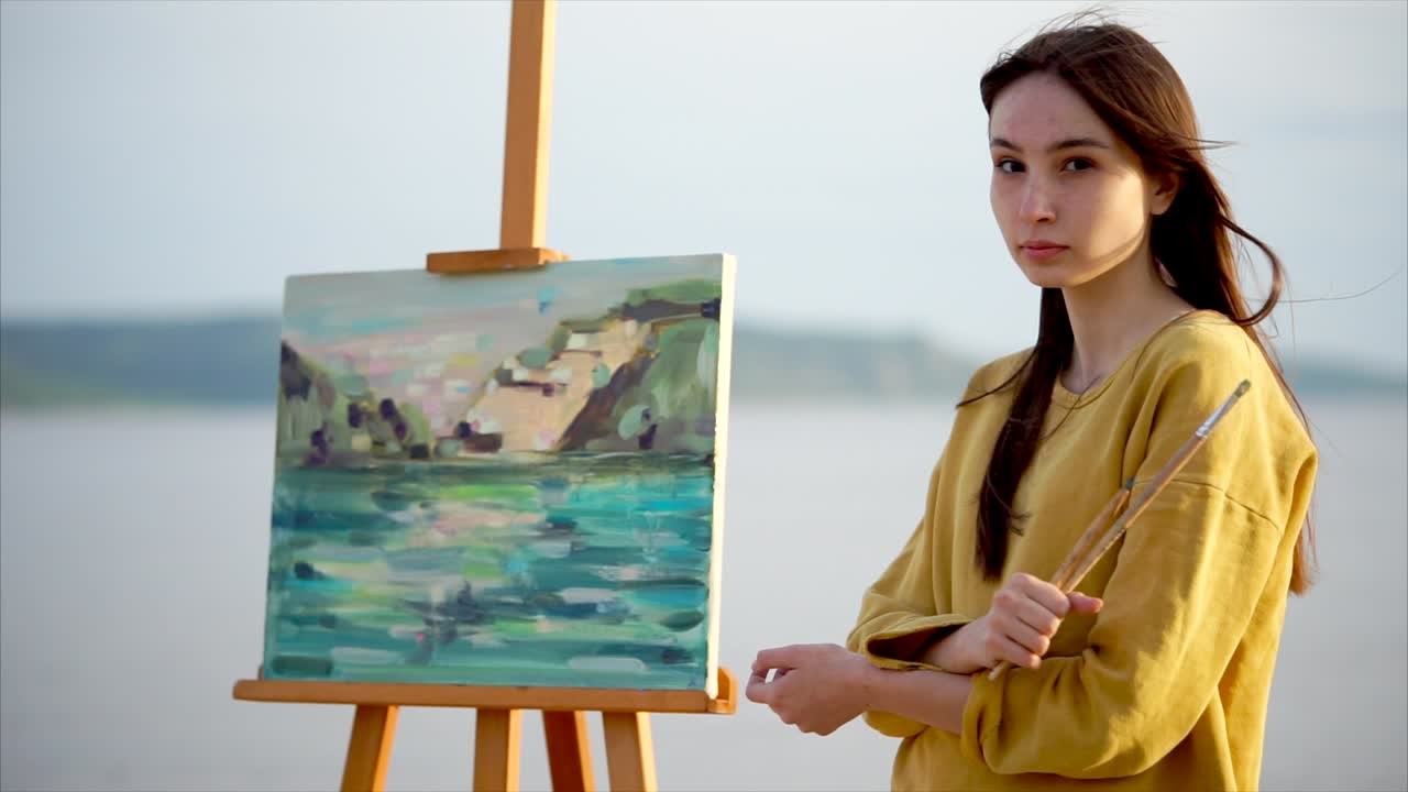 Young Woman Painting a Landscape
