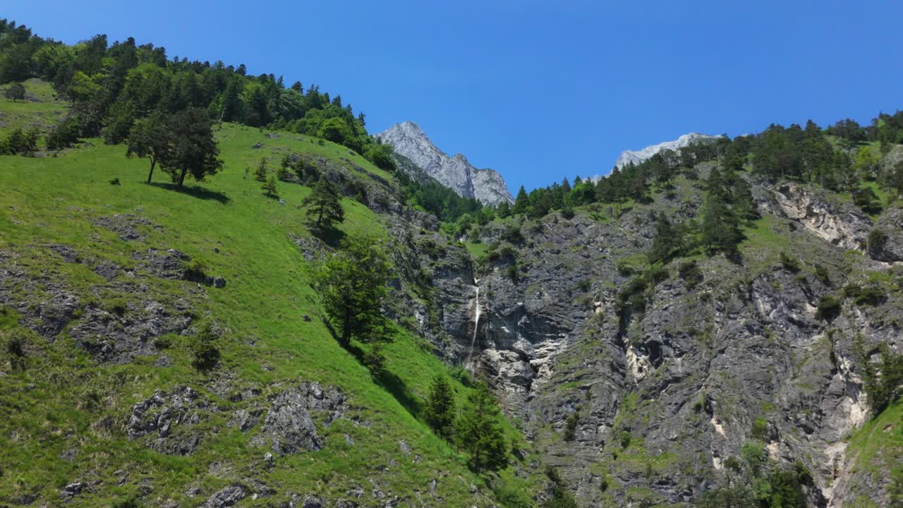 waterfall in the mountains in wild nature