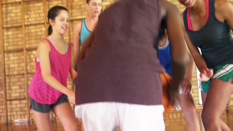 high school team playing basketball