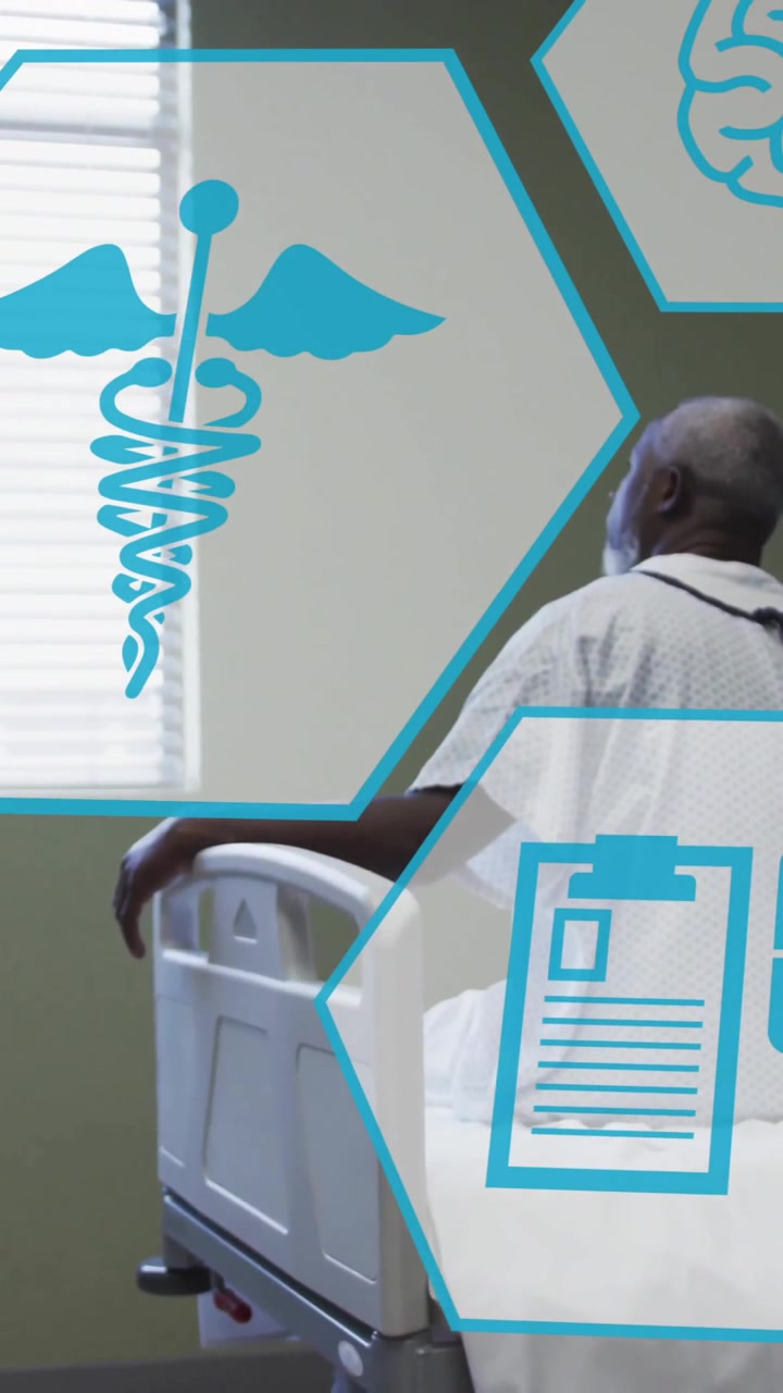 Animation of medical icons over african american man sitting on hospital bed