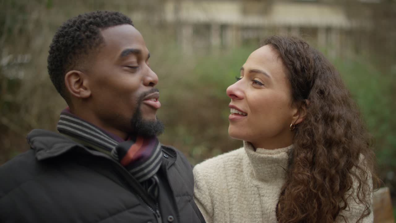 Couple Kiss on Park Bench