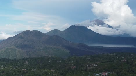 epic bali volcanos and village aerial 4k drone footage: majestic views of batur, abang, and agung