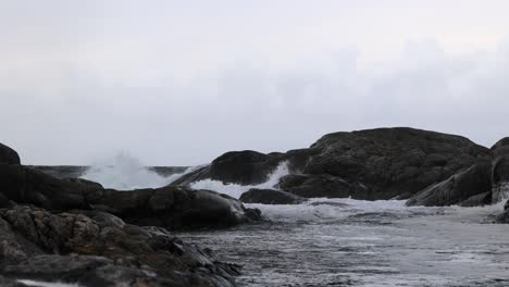 rough sea pounds shore in western norway