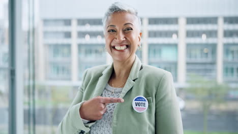 Smile,-vote-and-a-woman-pointing-to-a-badge