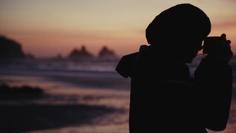 photographer at sunset beach
