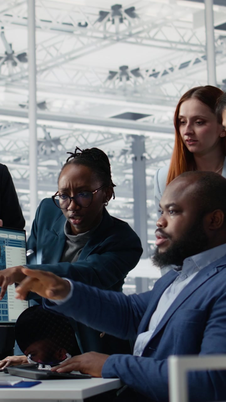 Vertical video Optimizing production, microchip and multiracial men with women in factory