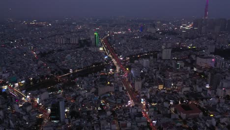 ho chi minh city vietnam evening featuring key buildings of skyline and saigon river under lights